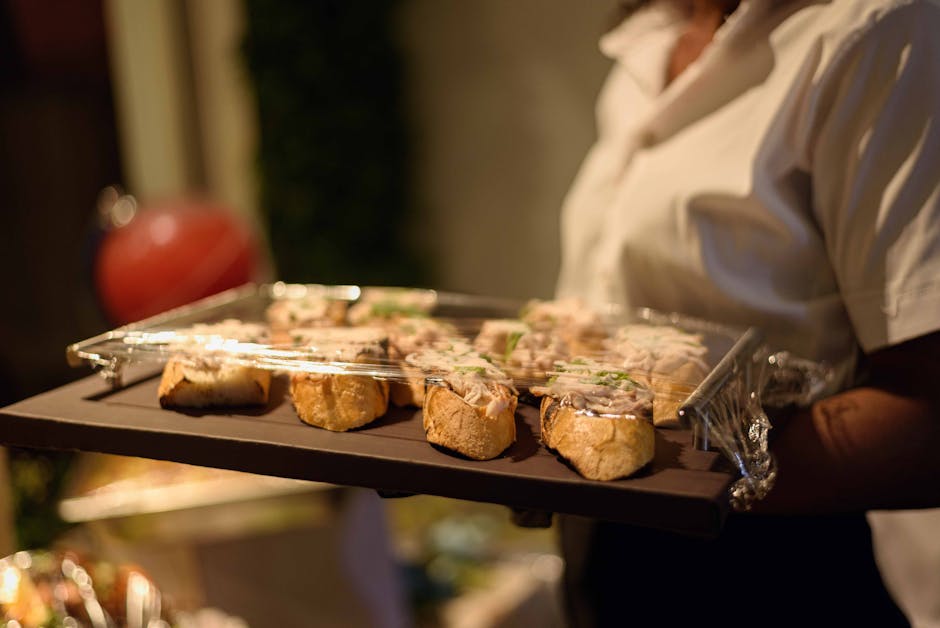 Waiter serving gourmet appetizers at a wedding reception